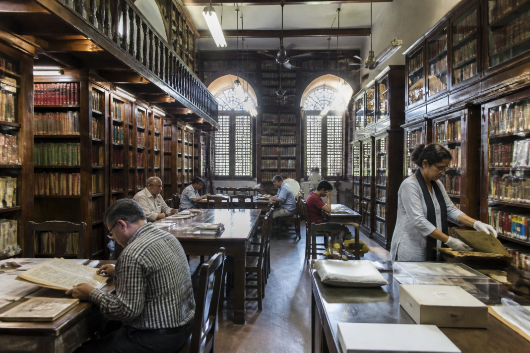 Mohammed Ali Library restoration in Kolkata with repaired wooden shelves and preserved books