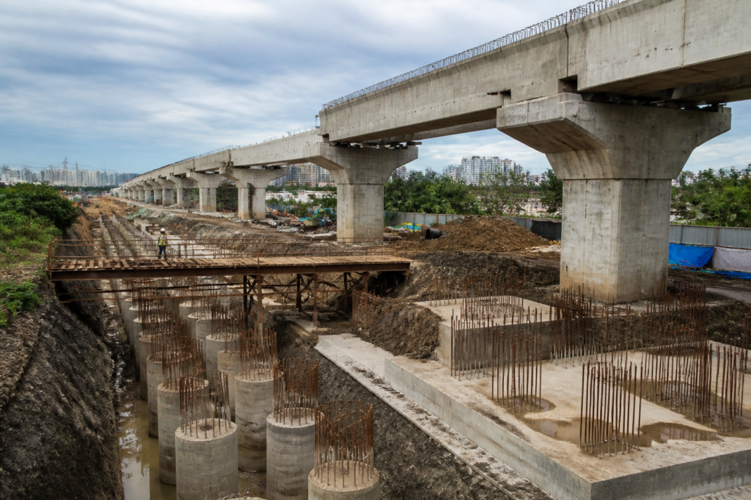 Dahisar-Bhayandar Link Road construction site with elevated road foundations and bridge piers