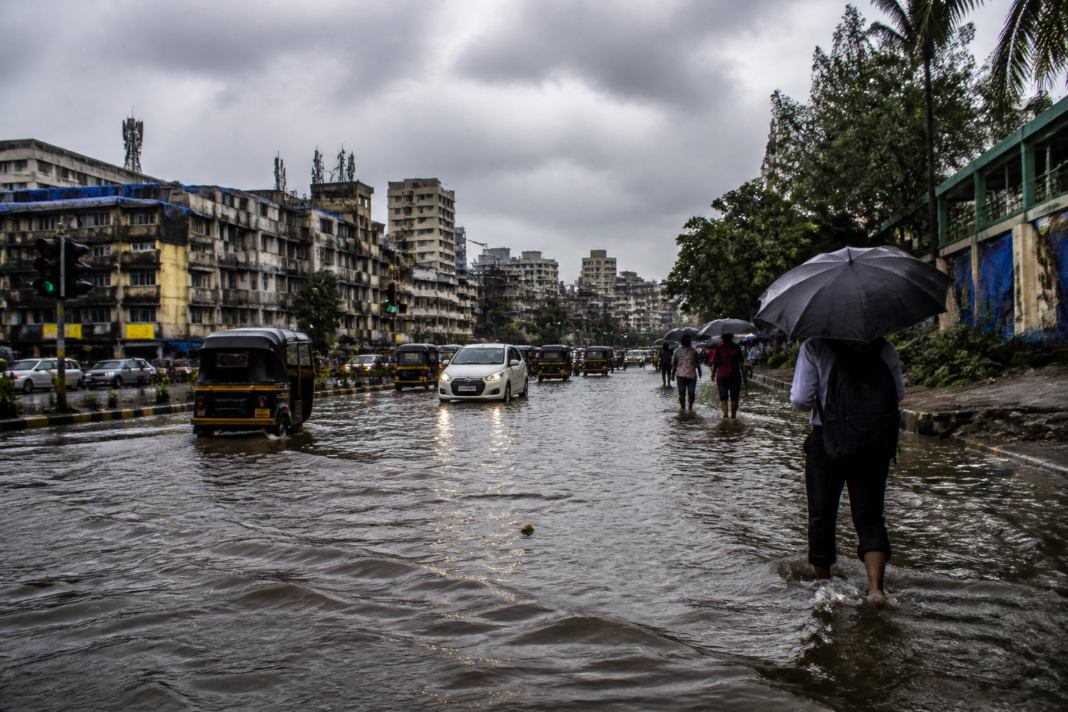 Mumbai rain alert with waterlogged low-lying roads during persistent monsoon rain