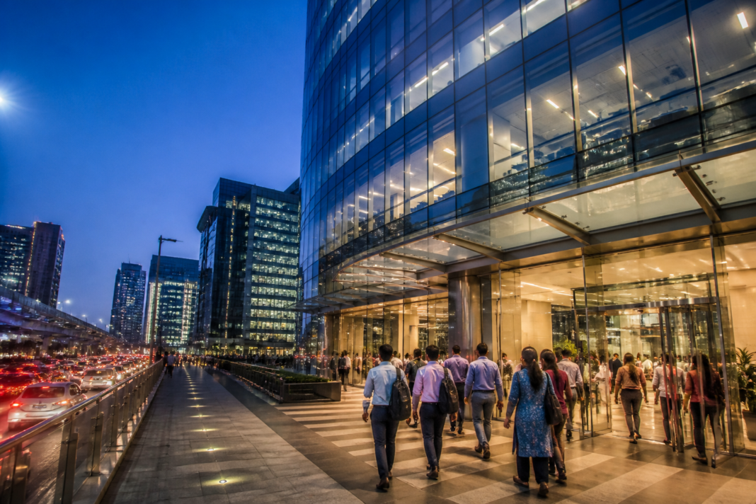 PwC India consulting JV represented by a modern Indian office district and consulting professionals
