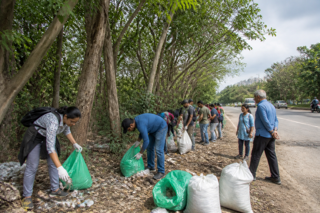 Turahalli Forest clean-up volunteers removing dumped waste near Bengaluru’s forest boundary