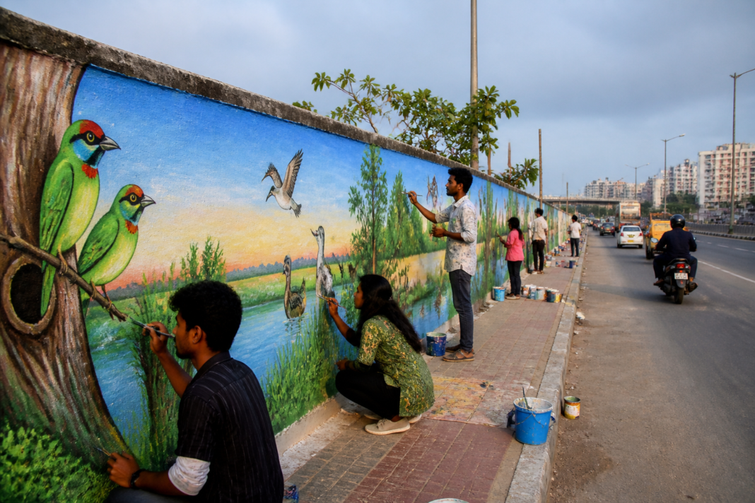 Chennai wildlife murals showing birds and wetlands on a city wall
