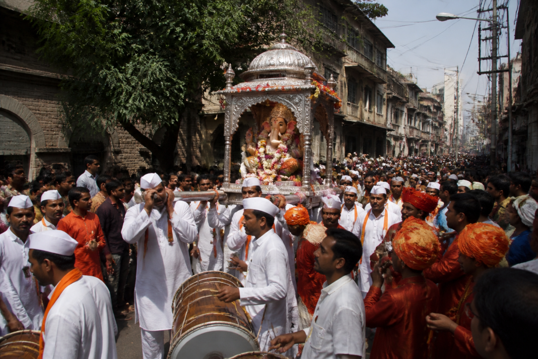 Pune Ganesh festival 2026 procession route with a Ganpati idol in a silver palanquin