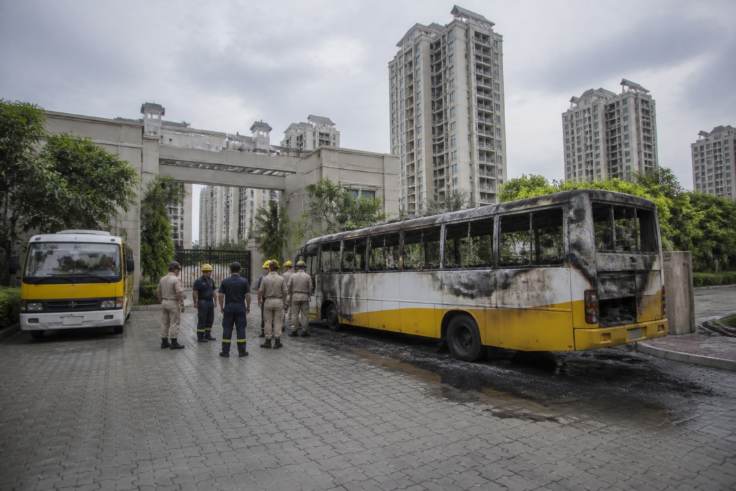Hyderabad school bus fire scene near a school campus in Tellapur