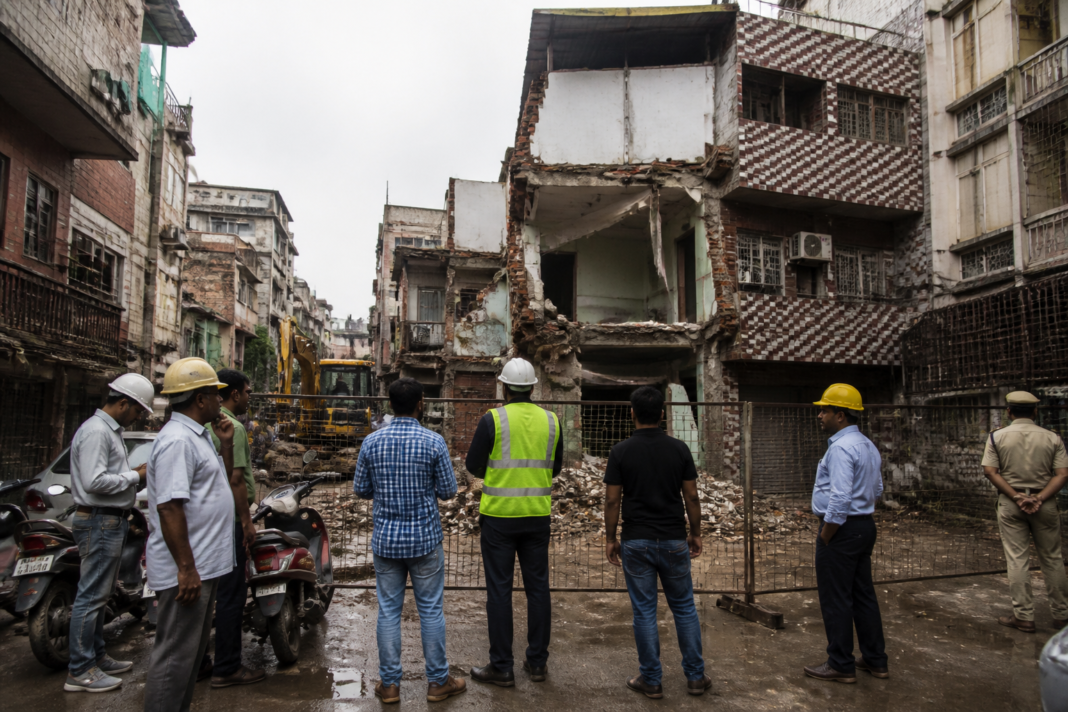 Delhi building safety drive near a sealed and demolished urban property
