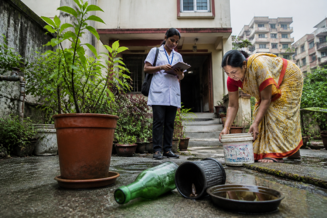 Dengue prevention near a Kolkata home with a flower pot and water container flagged as breeding risks