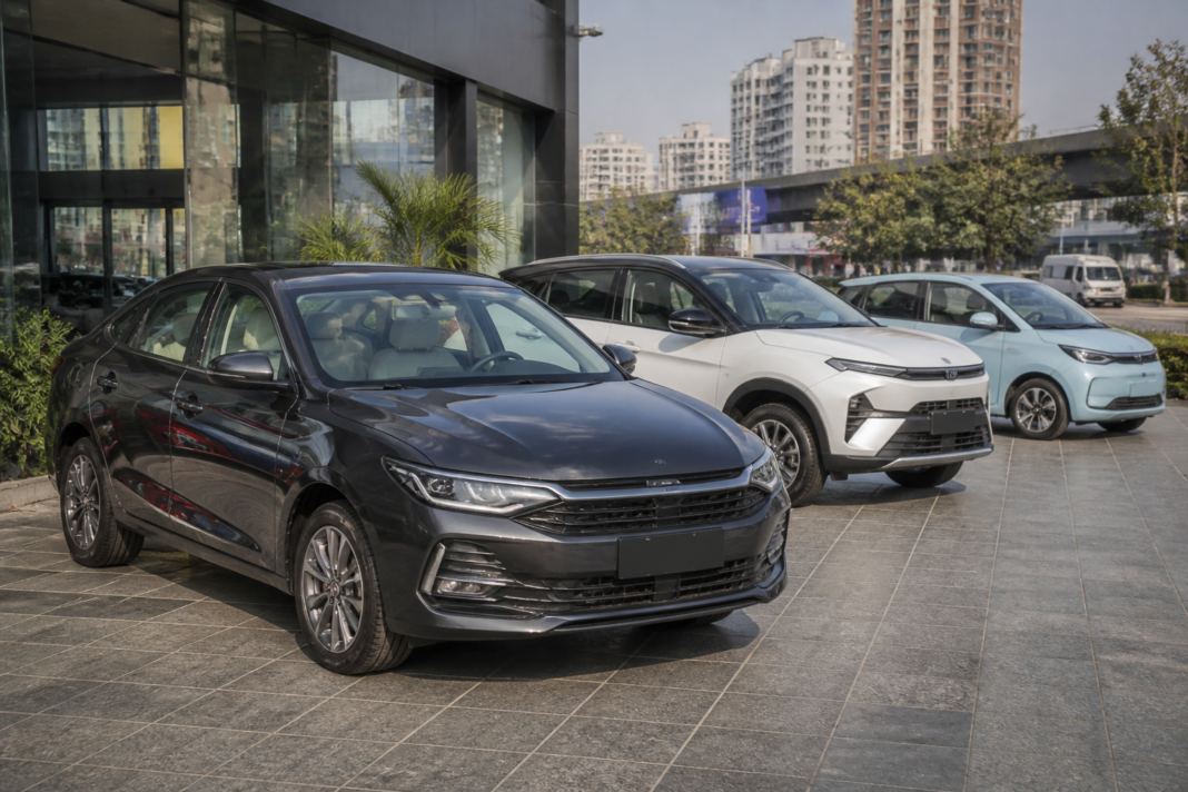 Petrol-powered cars displayed at an Indian dealership amid the rise of hybrid and electric vehicles