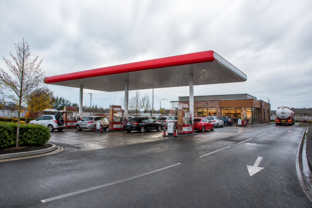 UK forecourt network with fuel pumps and retail facilities at a British roadside service station
