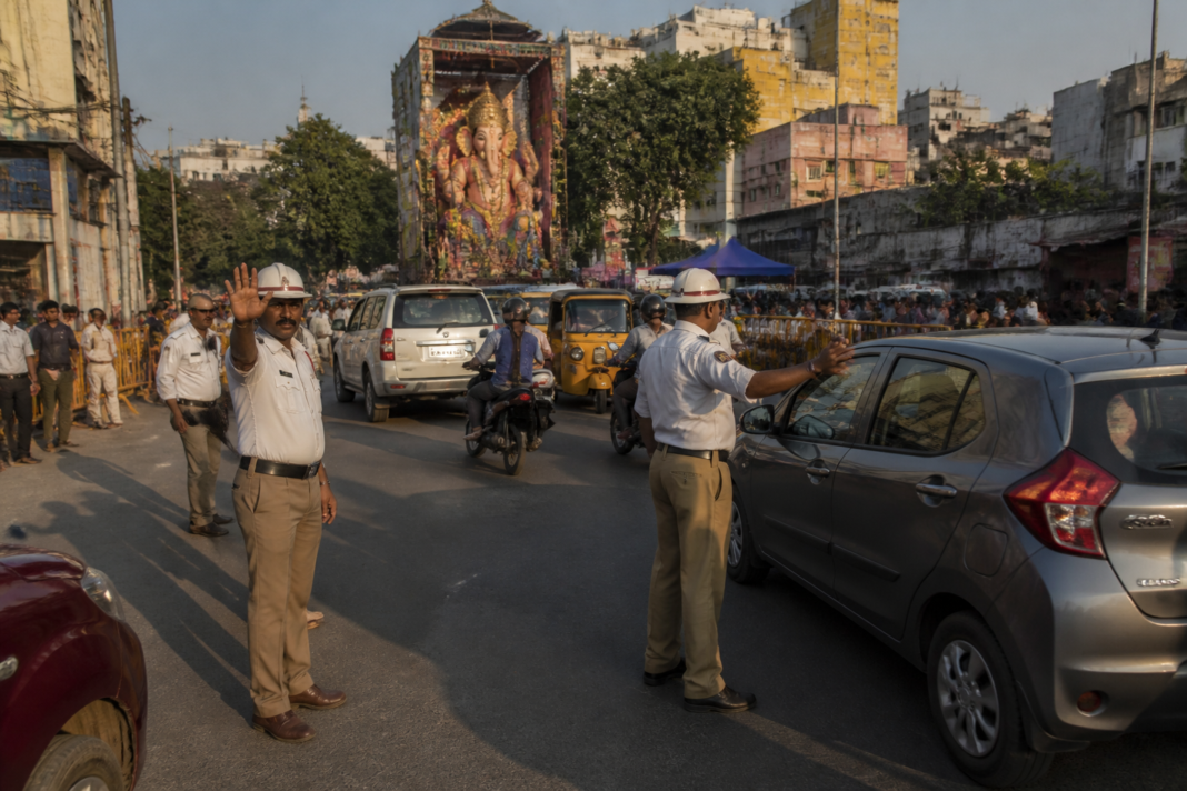 Hyderabad Ganesh festival traffic police managing vehicles near Khairatabad