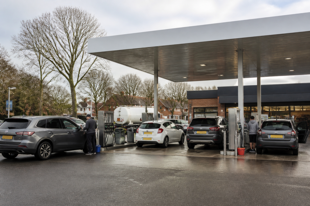 Essar SGN acquisition expands a UK fuel forecourt network with cars at a petrol station