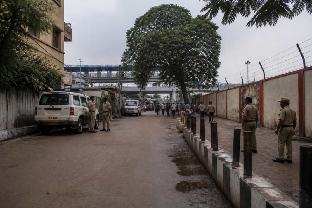 Hyderabad POCSO case investigation near a railway station, shown through a non-identifying urban police scene.