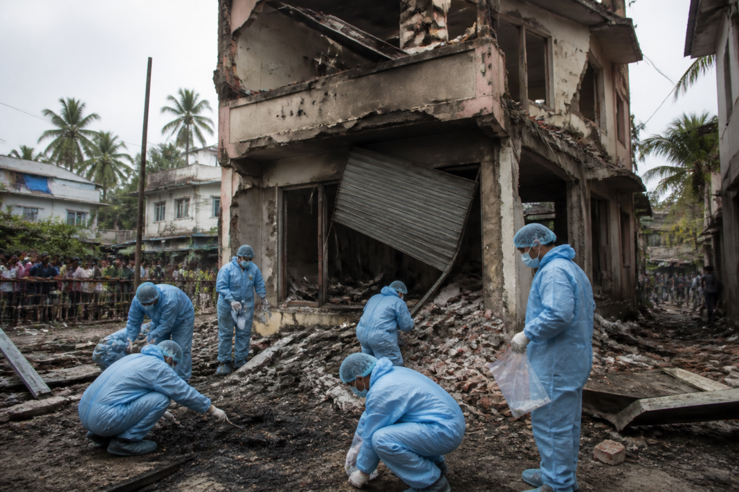 Damaged house after the Baruipur explosion as forensic investigators examine the site
