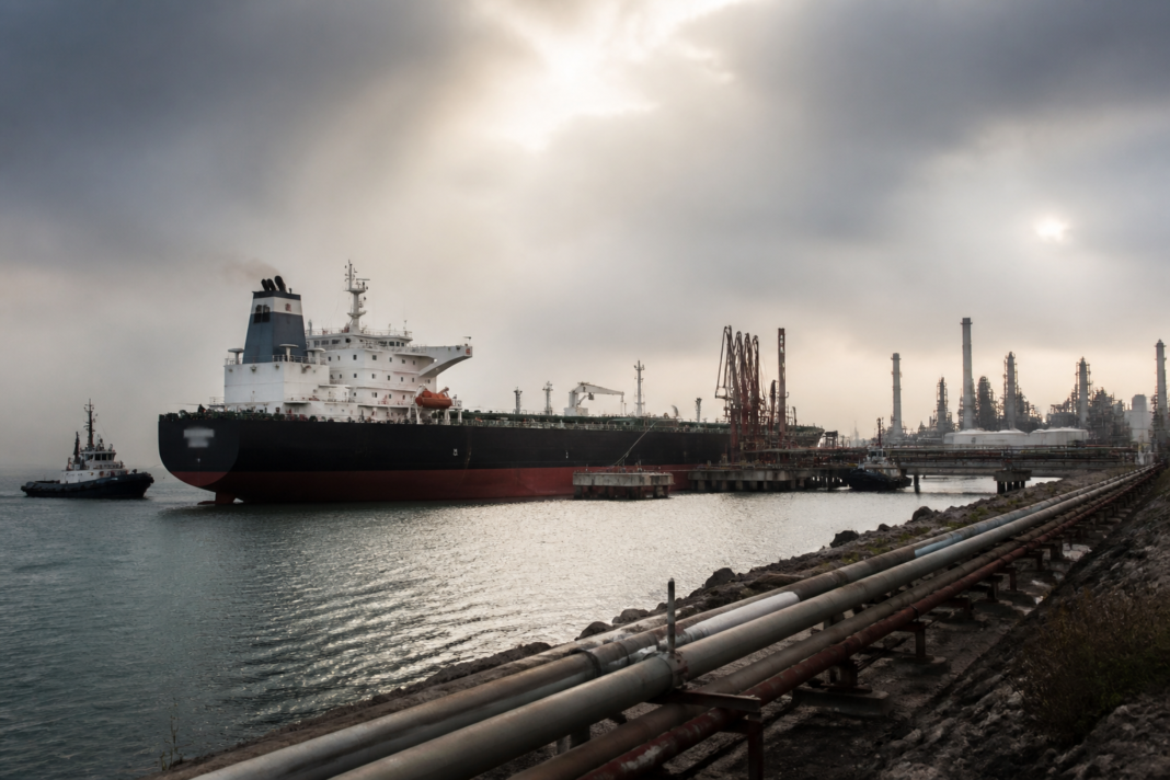 India crude oil imports under pressure as an oil tanker approaches a refinery