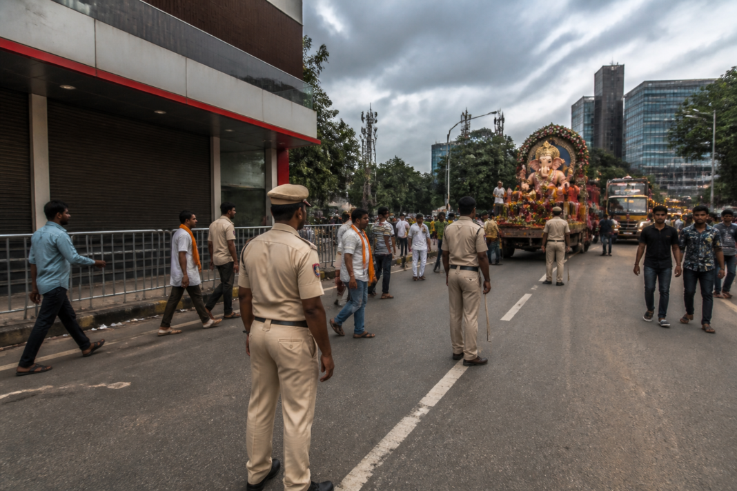 Bengaluru liquor ban notice during a Ganesh immersion procession