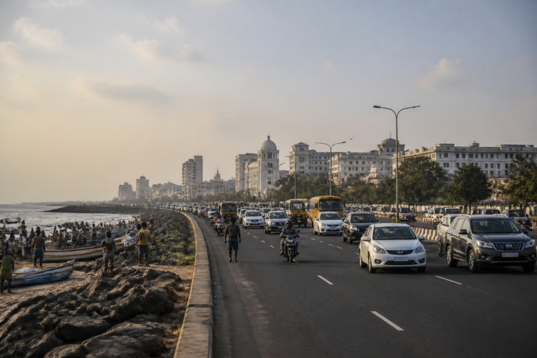 Foreshore Estate secretariat site and Chennai’s coastal road with traffic and public activity