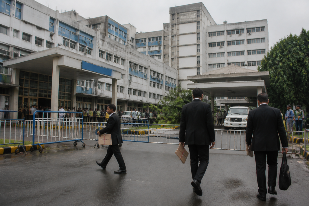 RG Kar case investigation documents and a Kolkata public hospital exterior