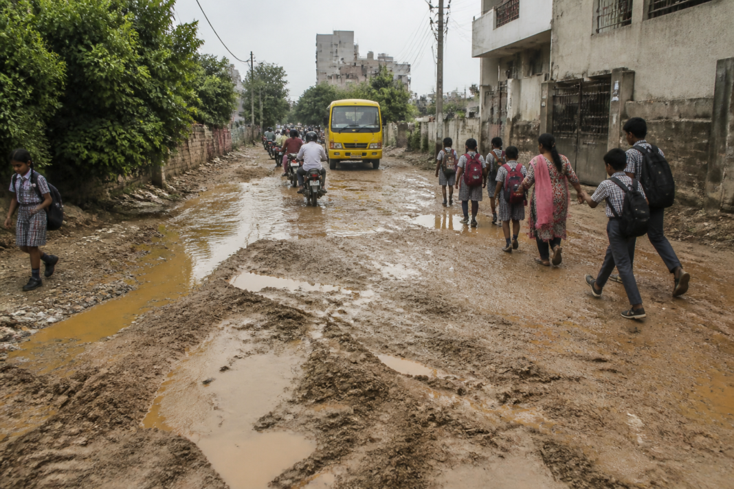 Aali Vihar road remains unpaved and muddy after rain in south Delhi.