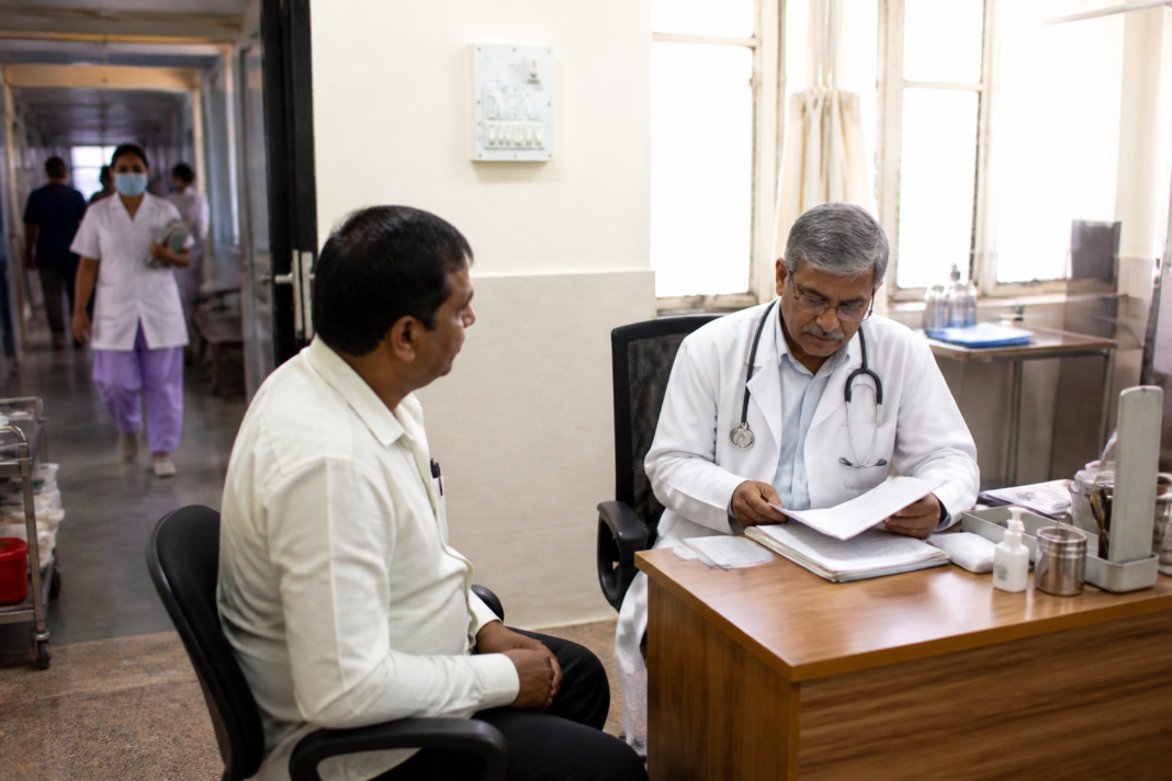 Maharashtra senior medical officers conducting an outpatient consultation at a public hospital