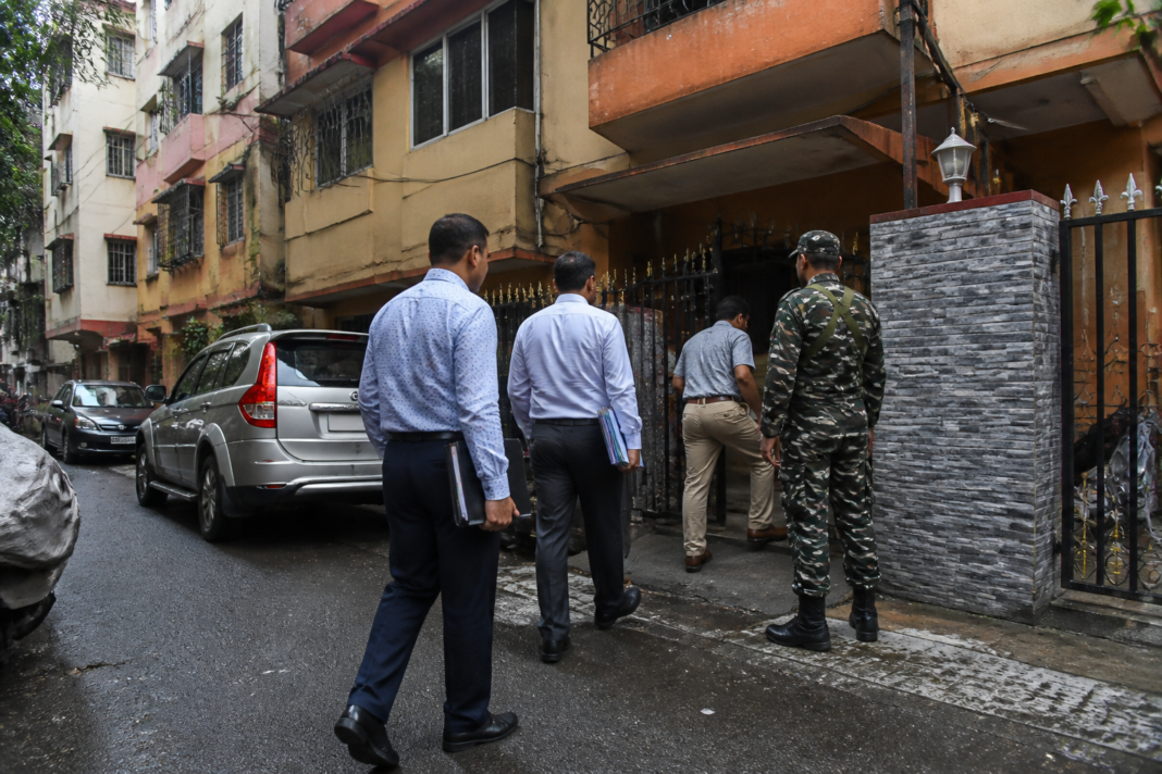 Kolkata ED raids at a city residence during a financial fraud investigation