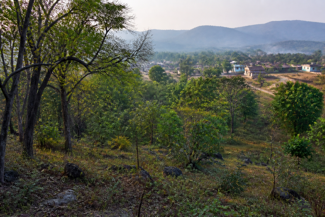 Nagarahole eco-sensitive zone surrounding forest landscape and nearby village settlement