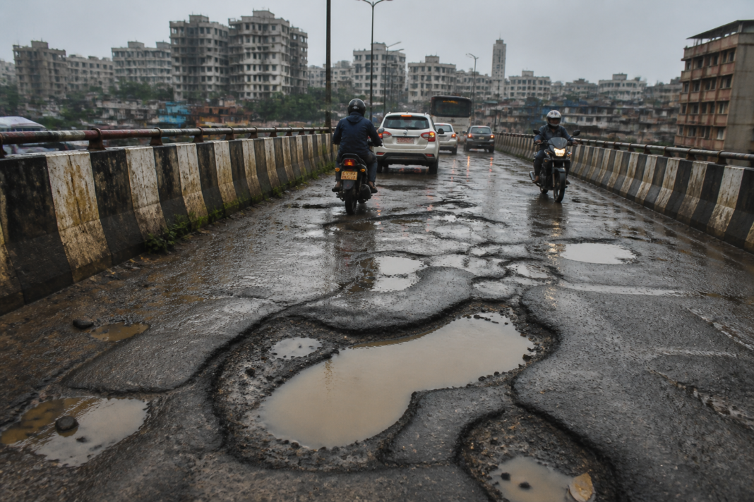 Badlapur flyover potholes reappearing after rain on a key urban road link