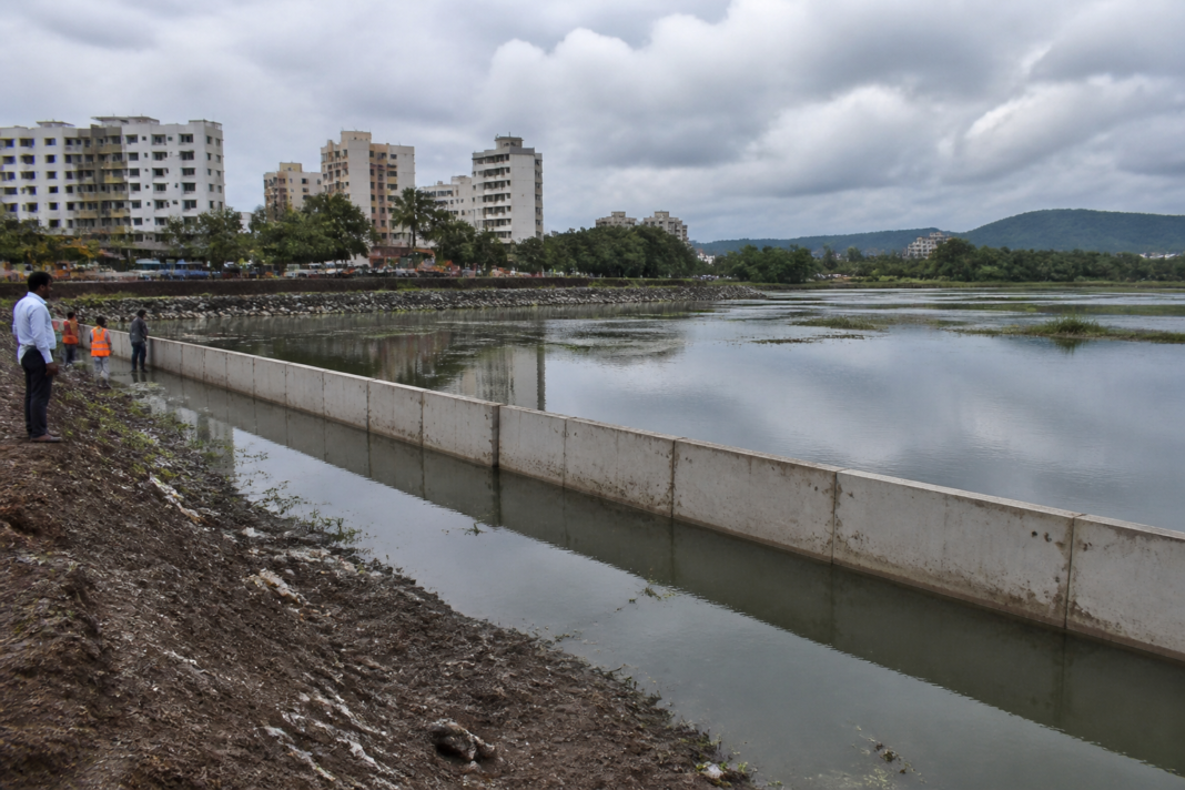 Mira Bhayandar artificial lake created inside a natural water body with a concrete dividing wall