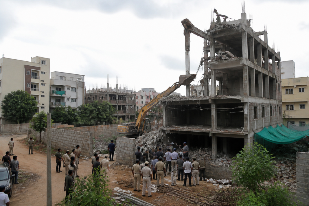 Cyberabad civic body enforcement teams demolishing an unauthorised construction in Hyderabad