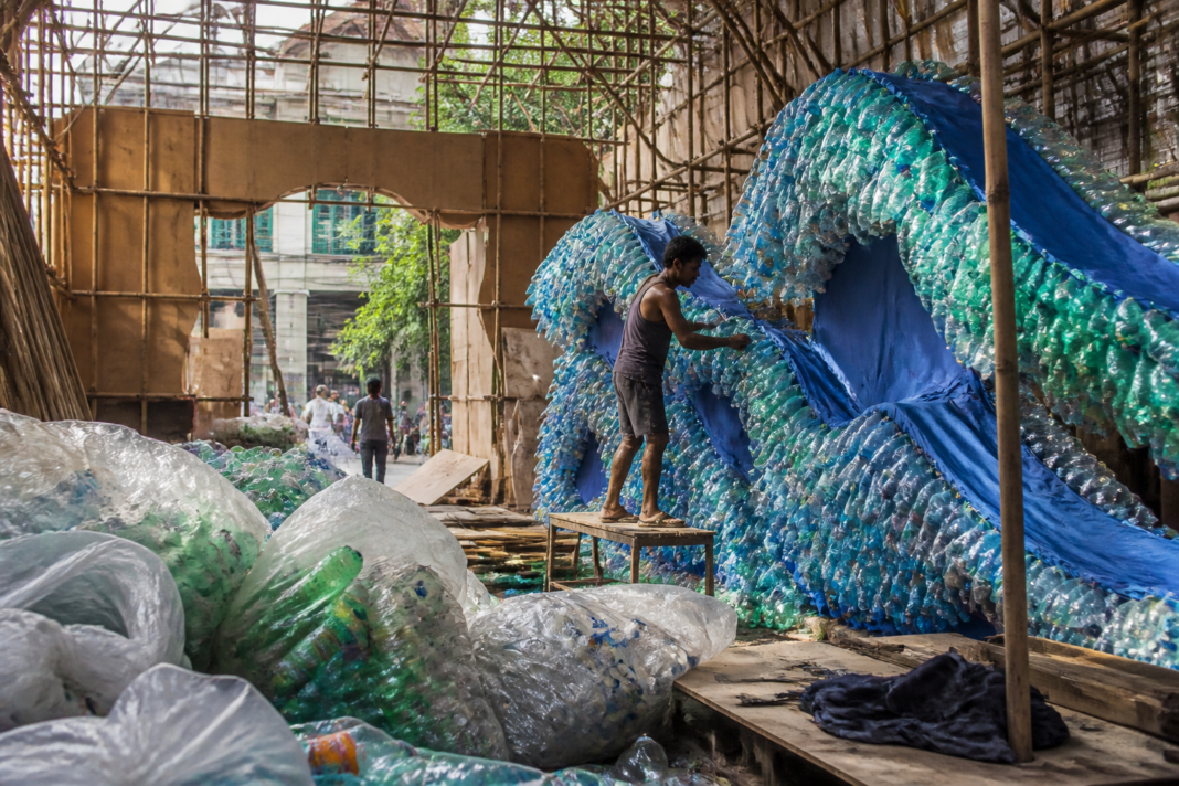 Kolkata Durga Puja pandal decorated with plastic bottles shaped into blue ocean waves