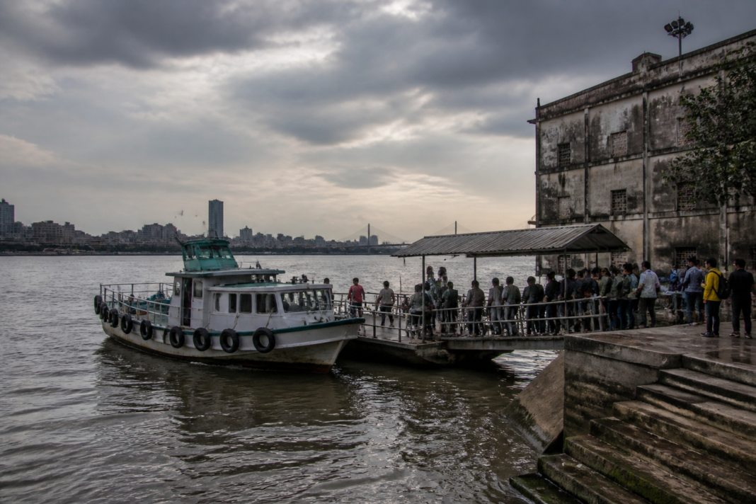 Kolkata launch service vessel on the Hooghly near a ferry ghat