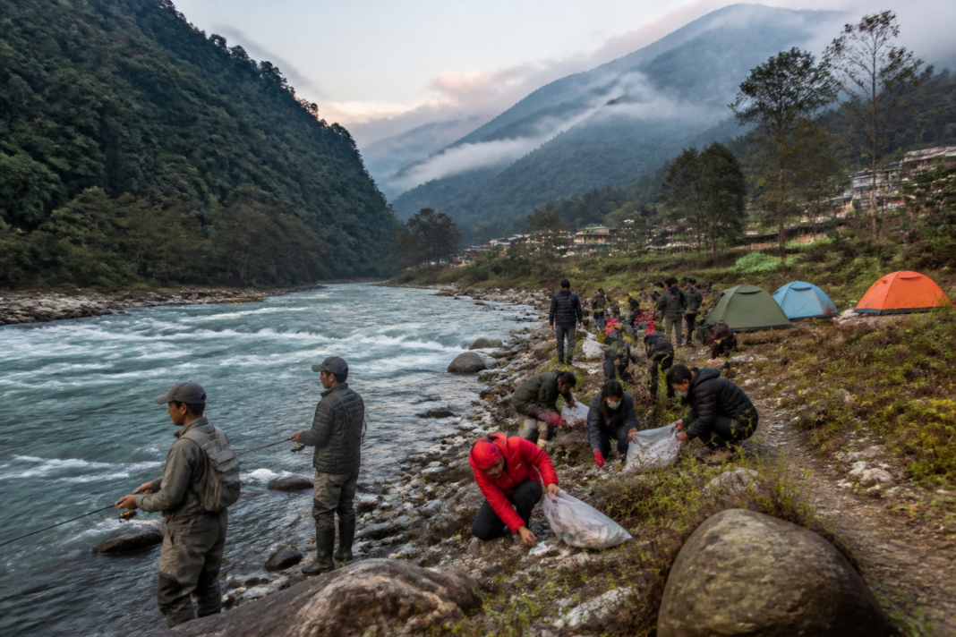 Rangeet River conservation festival site near Jorethang with riverside camping and mountain landscape