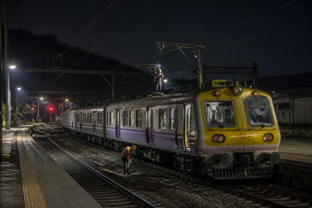 Mumbai local train at night near Khopoli during a Central Railway maintenance block