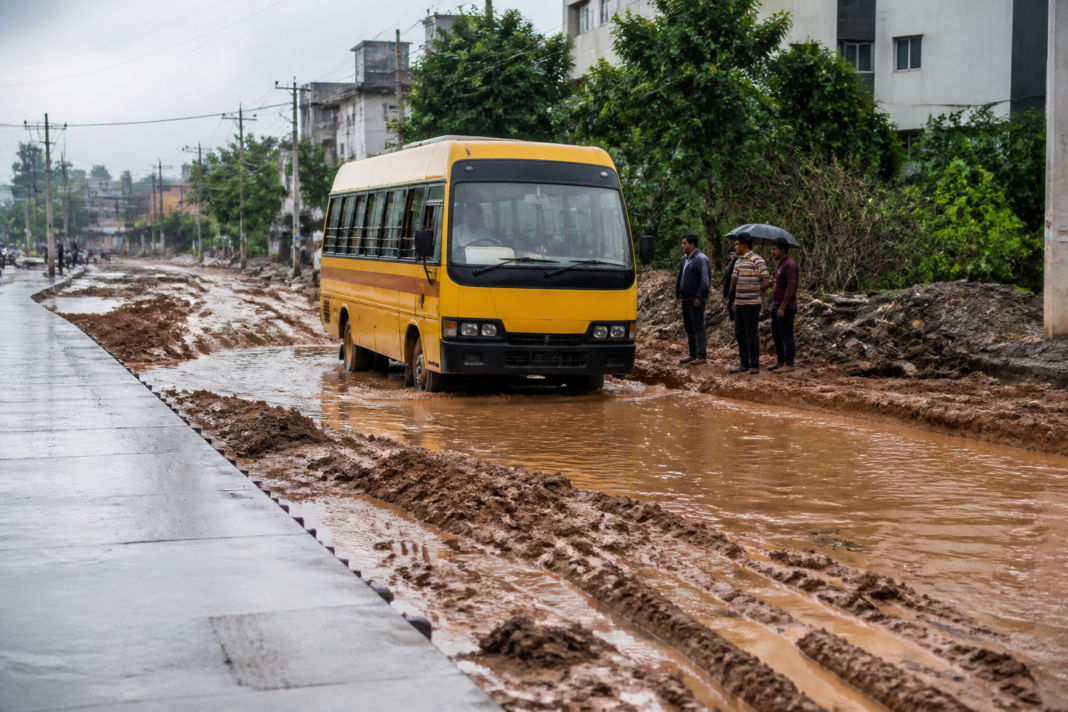 Bengaluru school bus stranded on the muddy Kodathi-Avalahalli road after rain