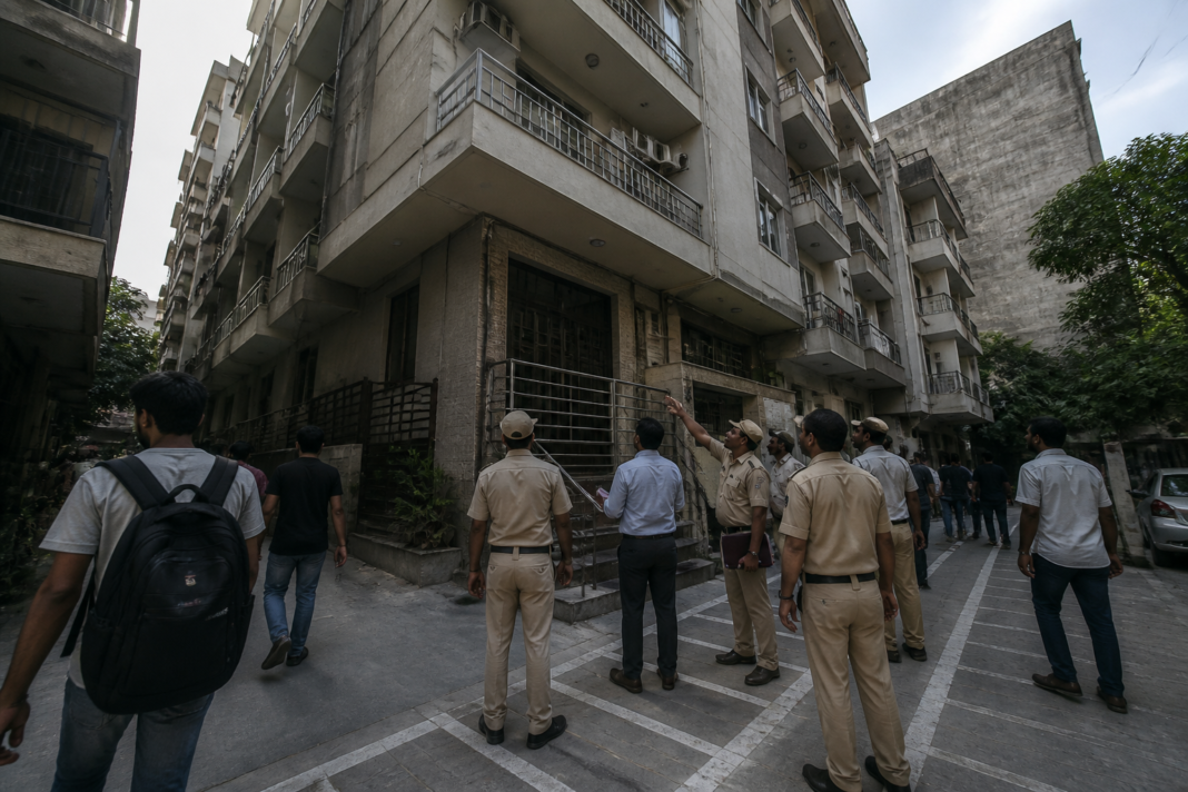 Delhi PG safety concerns outside a dense student accommodation building in Satya Niketan