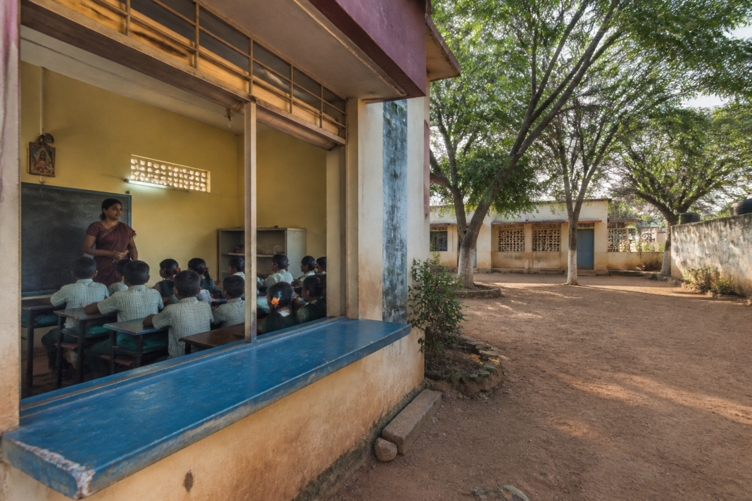 Tamil Nadu government school classroom with a small group of students and limited teaching staff.