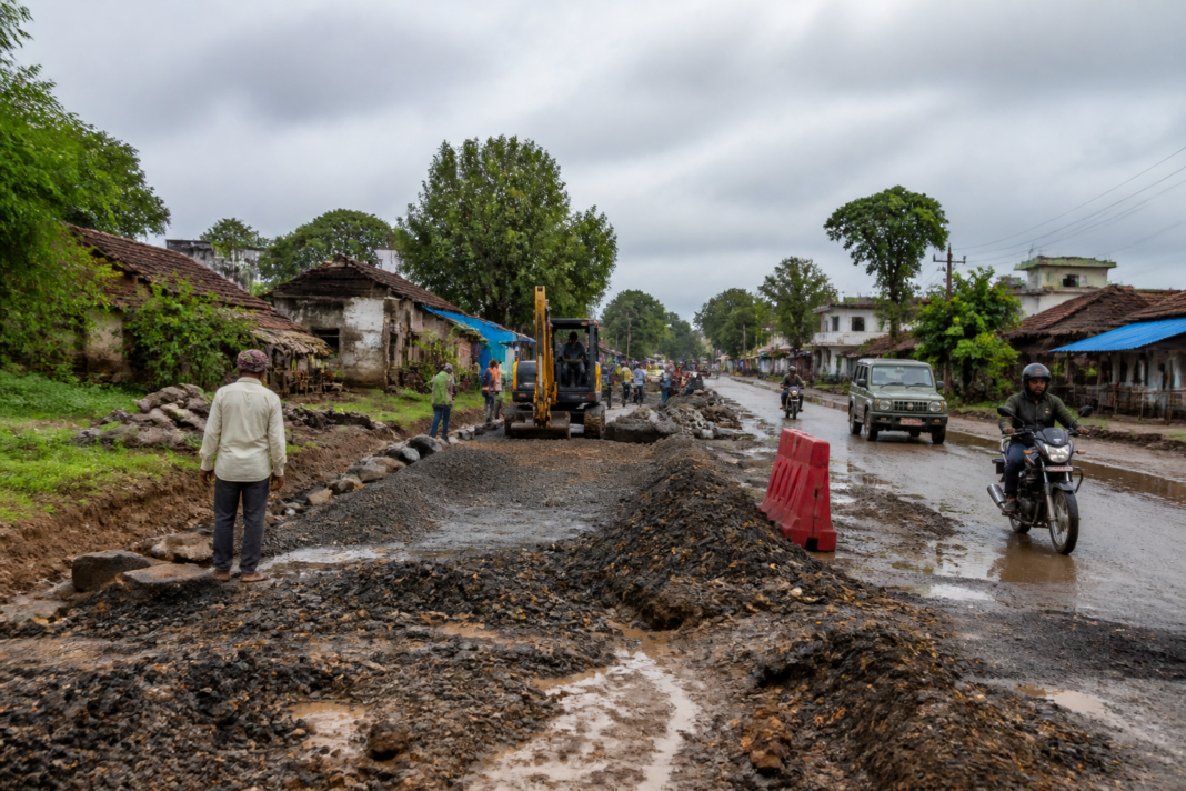 Telangana road repairs on a damaged rural road connecting villages in the state