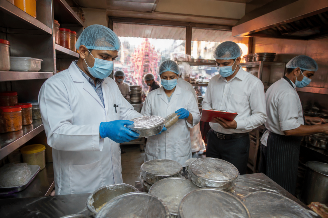 Kolkata food safety raids at a restaurant kitchen before Durga Puja inspections.