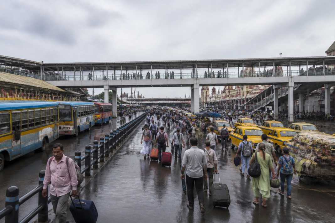 Howrah station redevelopment plan showing a busy transport interchange and pedestrian connection