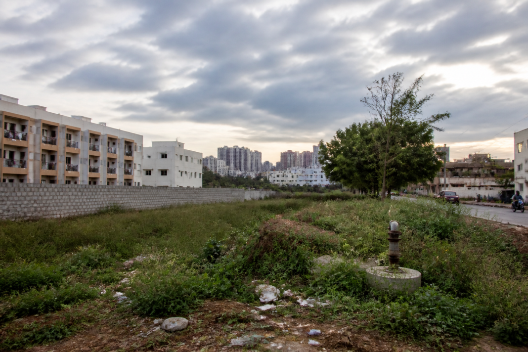 KR Pura land dispute site in Bengaluru with urban development and historic land records context
