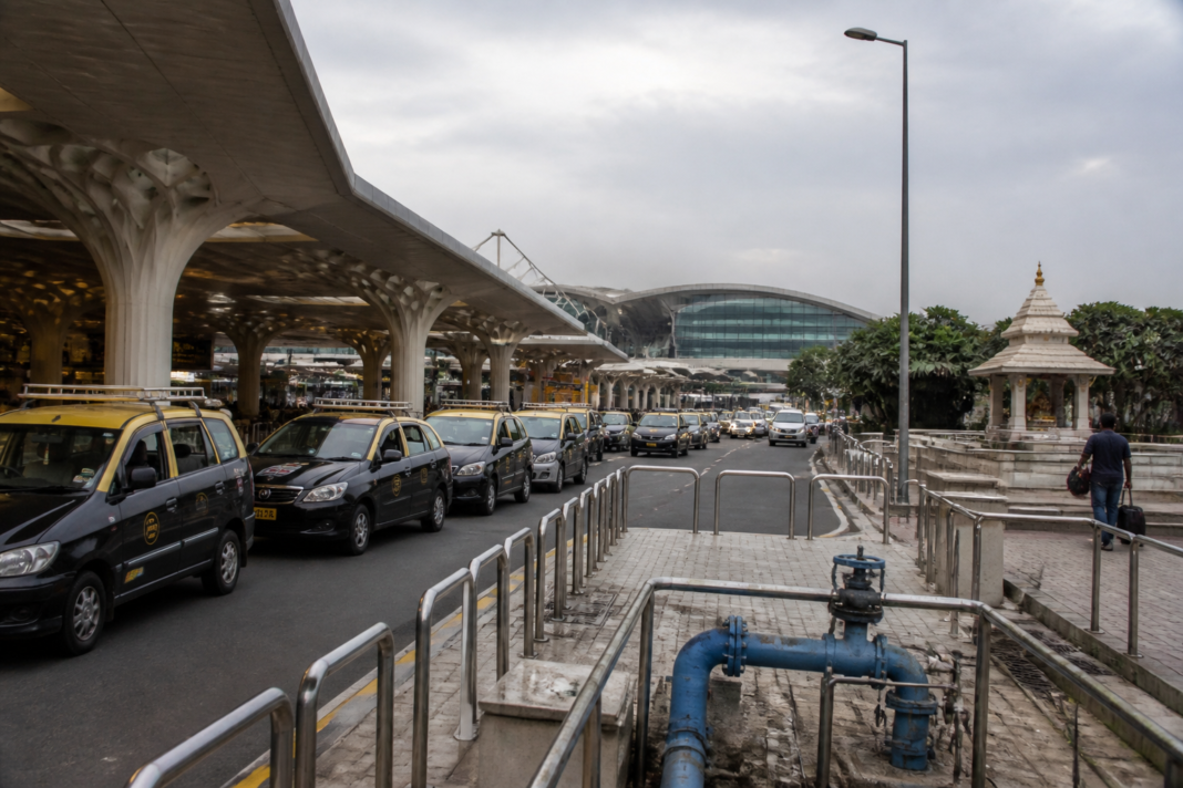 Mumbai airport terminal area linked to a BMC water supply notice over a mosque