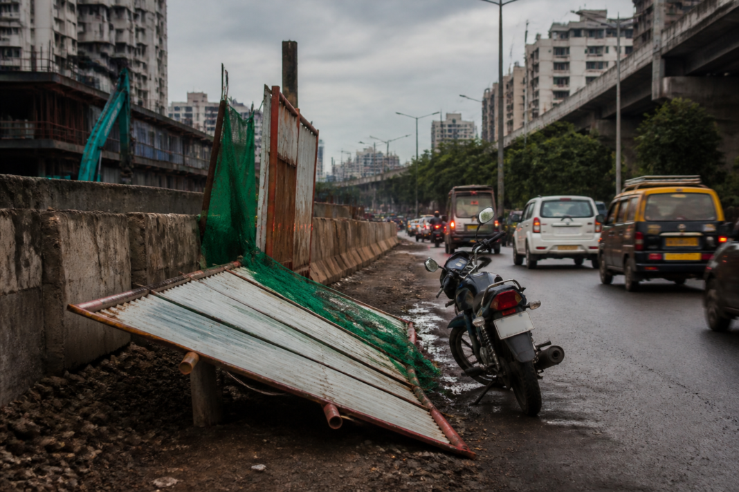 Mumbai Metro construction barricade beside traffic on LBS Marg in Vikhroli