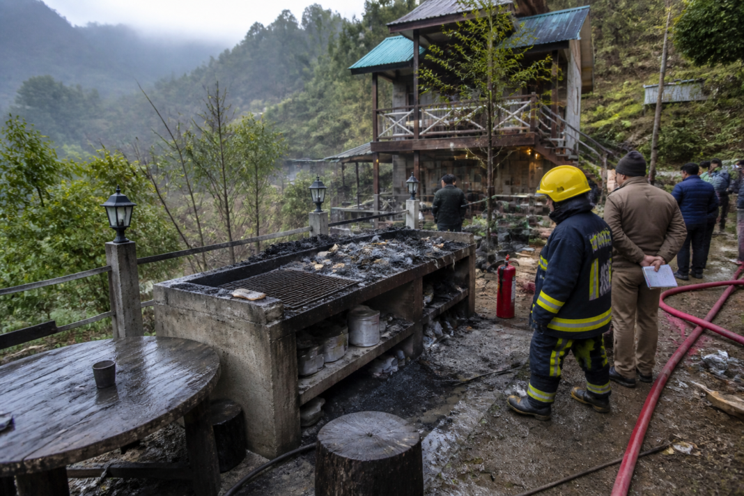 Darjeeling homestay fire scene with a barbecue area and emergency responders
