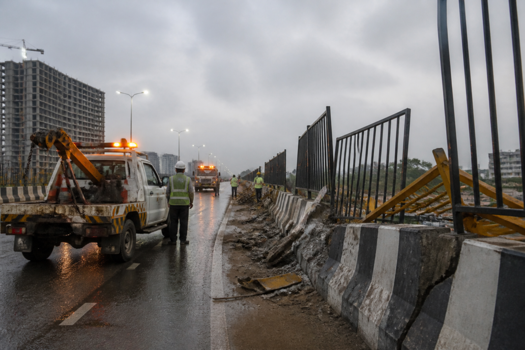 Gurugram crash site near Dwarka Expressway with roadside barriers and construction equipment