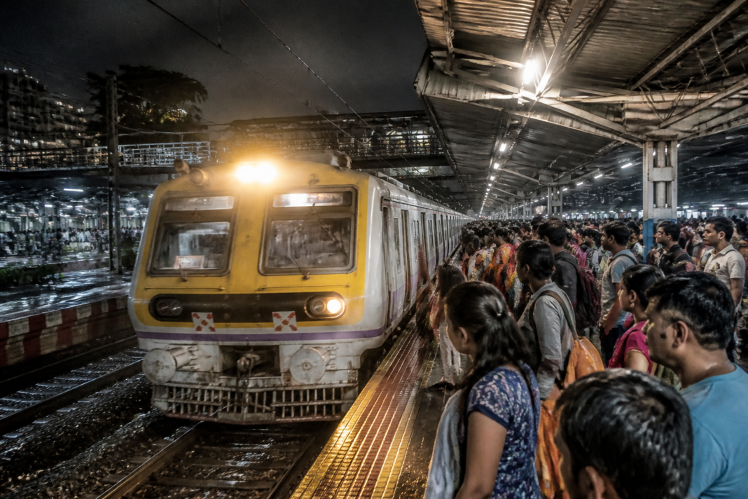 Ganpati special trains at a busy Mumbai suburban railway station during the festival night