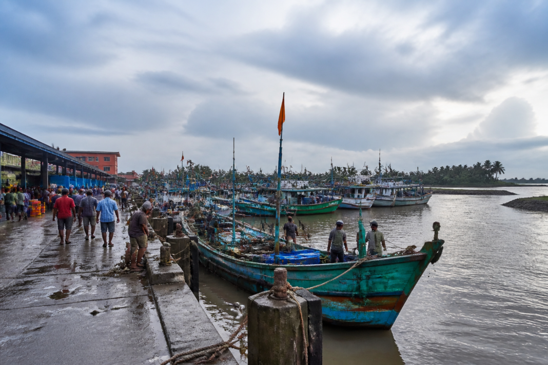 Mangaluru harbour with fishing boats and waterfront access roads