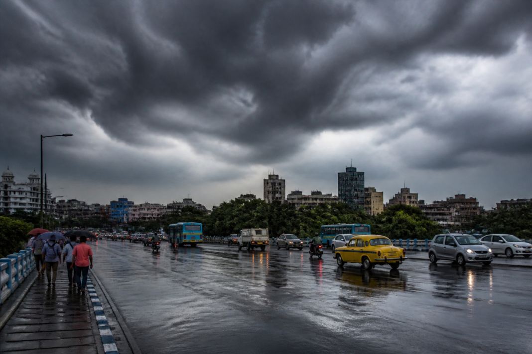 Kolkata rain forecast showing dark monsoon clouds over the city skyline