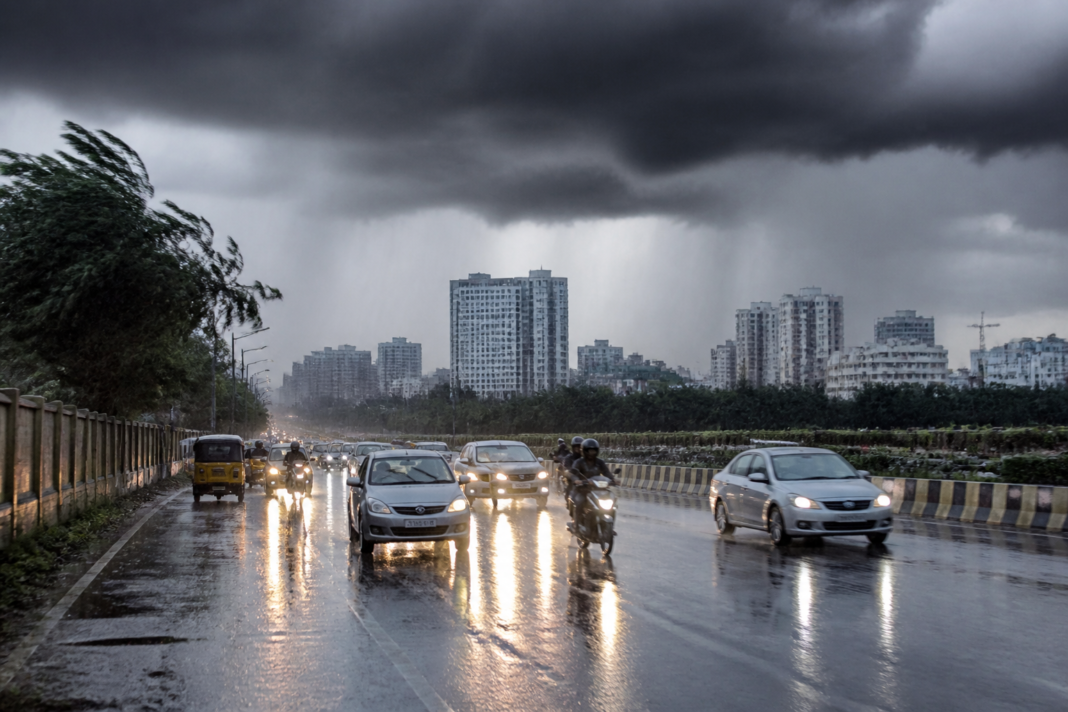 Bengaluru rain forecast showing dark monsoon clouds over the city's urban skyline