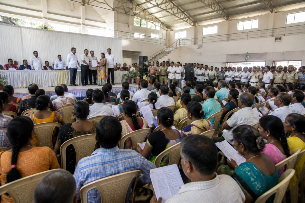 GO 118 certificates being distributed to LB Nagar residents at a Saroornagar programme