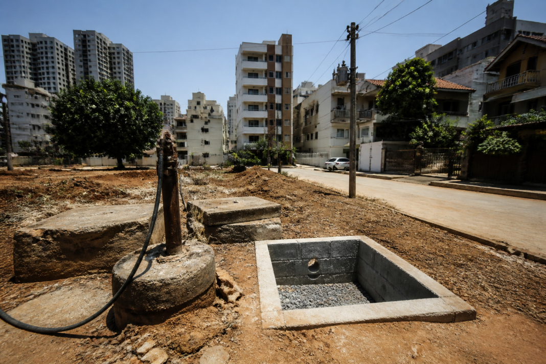 Bengaluru groundwater crisis reflected by a dry urban borewell and rainwater recharge pit