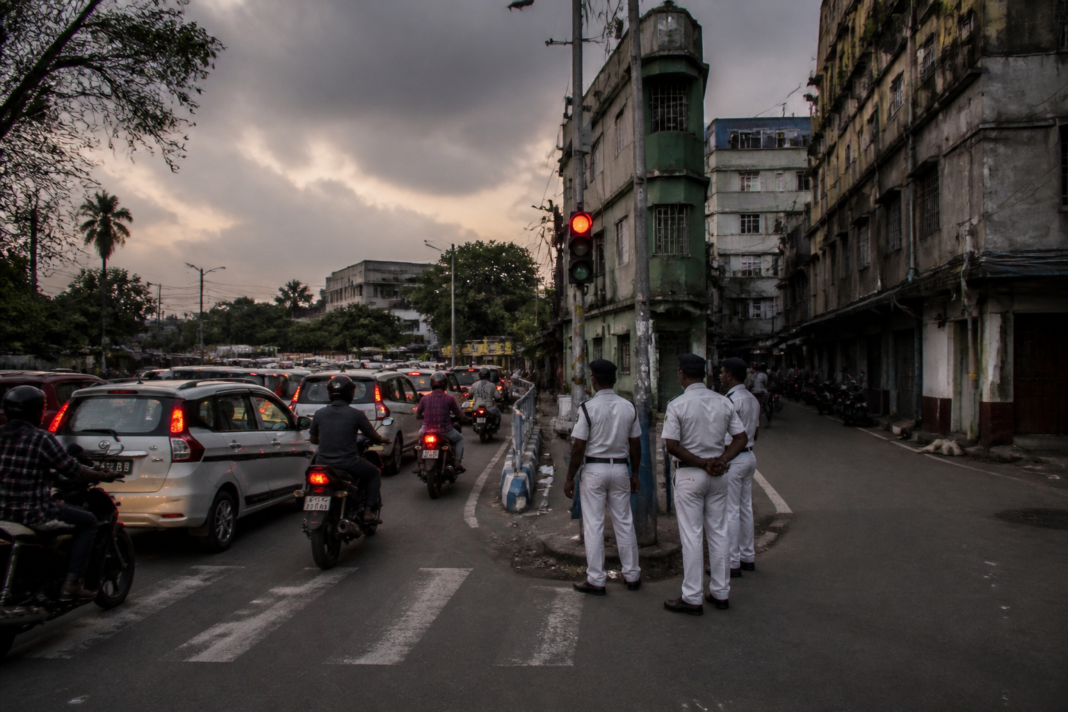 Kolkata assault case scene near a congested urban road connecting Nagerbazar and Lake Town