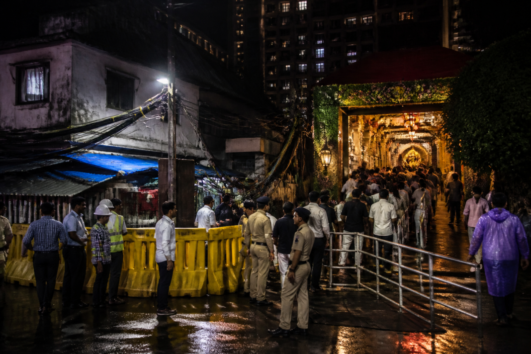 Mumbai Ganpati pandal entrance in Kalachowki with police and safety barriers after an electrocution incident